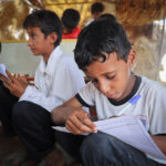 Yemeni children continue education in tents