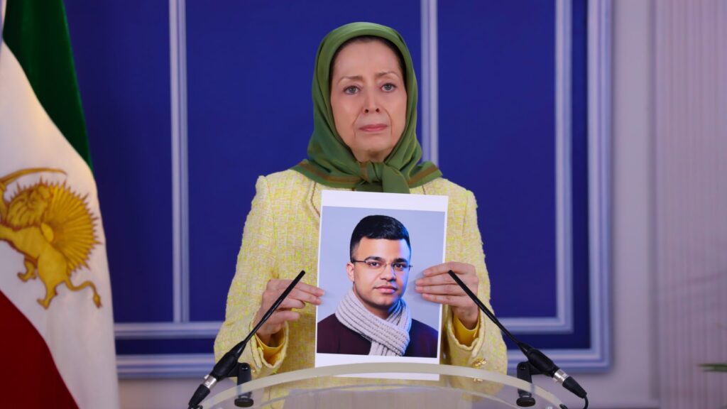Maryam-Rajavi-holding-Javads-photo-1600x900-1