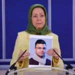 Maryam-Rajavi-holding-Javads-photo-1600x900-1