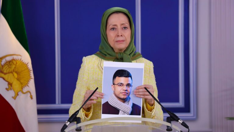 Maryam-Rajavi-holding-Javads-photo-1600x900-1